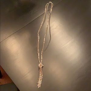 Silver toned and beaded necklace